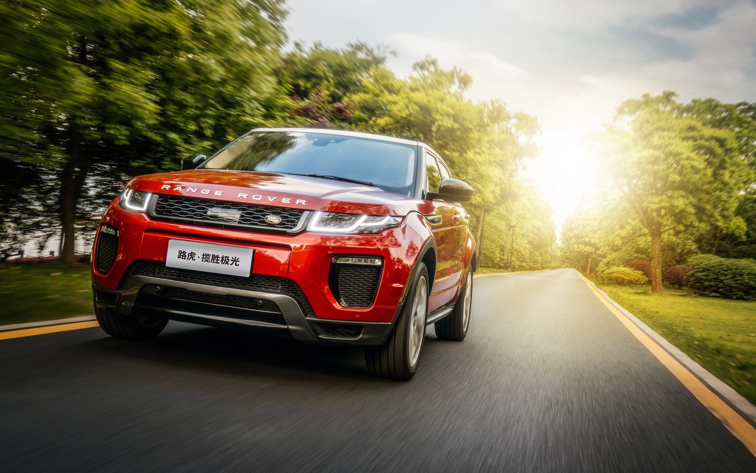 Land Rover Range Rover red SUV car speed, road, sun rays ...