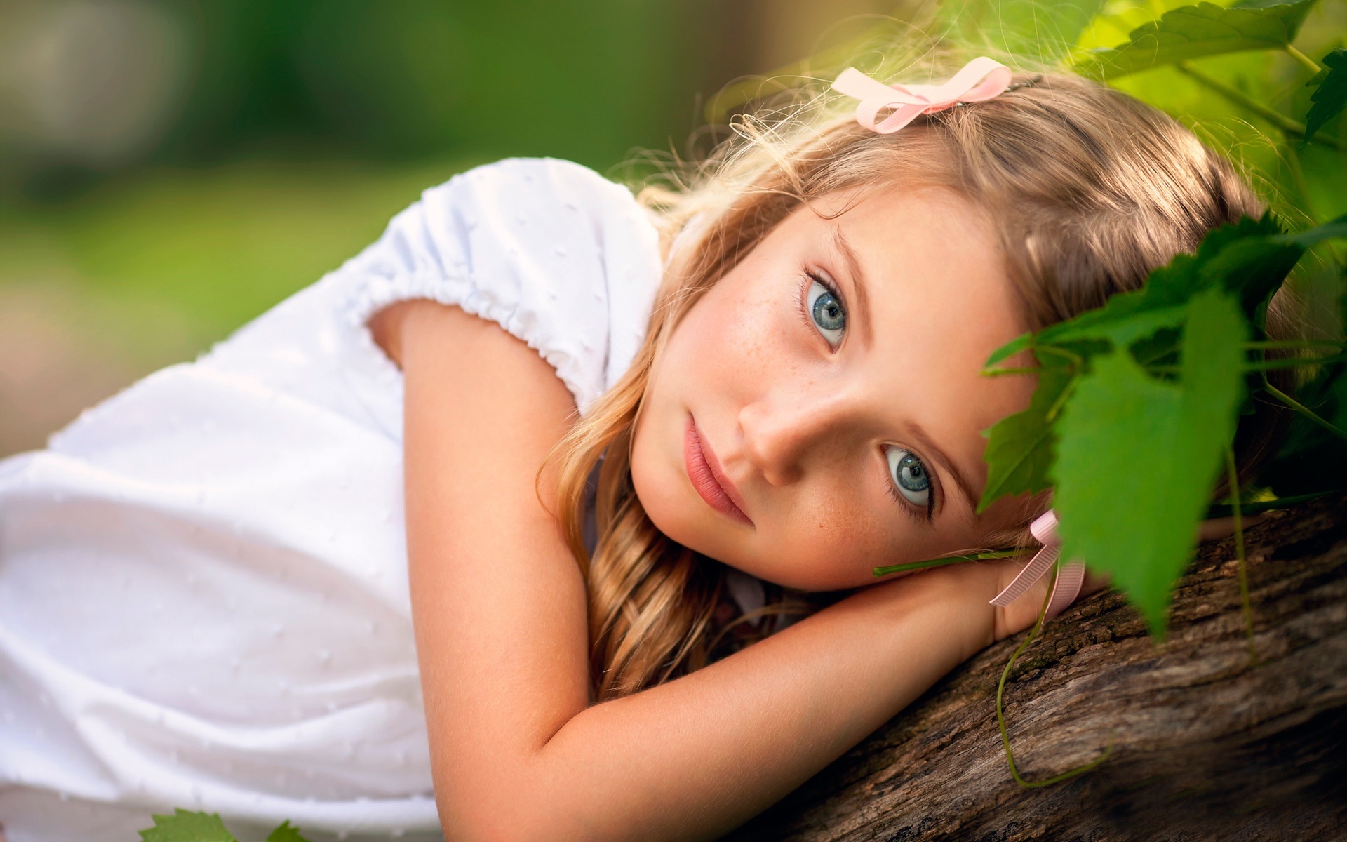 1. Cute little girl with blond hair playing in the park - wide 2