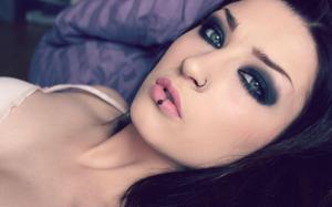 Brunette with face piercings wallpaper thumb