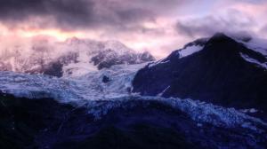 Purple Clouds Above Snowy Mountains wallpaper thumb