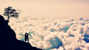 Couple silhouettes on a hill wallpaper thumb