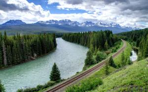 Forest, trees, river, railroad, mountains, clouds wallpaper thumb