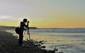 Photographer Beach Ocean Shore Rocks Stones HD wallpaper thumb