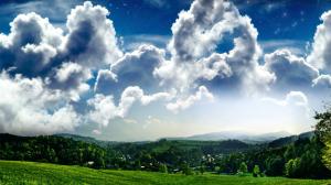 Puffy Clouds Above the Green Field wallpaper thumb