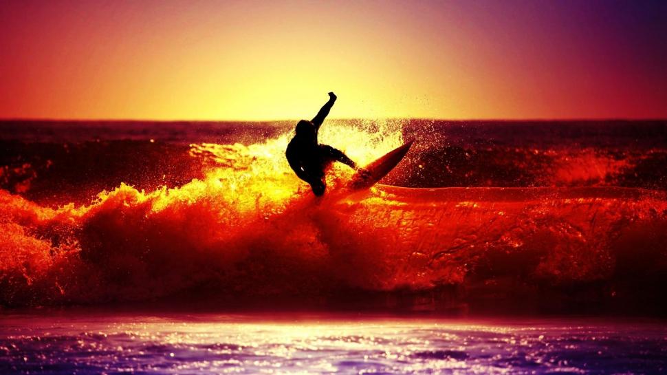 Surfing In Sunset wallpaper,surfer HD wallpaper,beach HD wallpaper,waves HD wallpaper,sunset HD wallpaper,nature & landscapes HD wallpaper,1920x1080 wallpaper