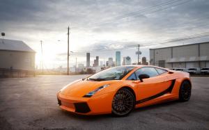 Lamborghini Gallardo orange supercar, city, sun, glare wallpaper thumb