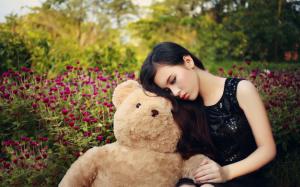 Sadness Asian girl and teddy bear wallpaper thumb