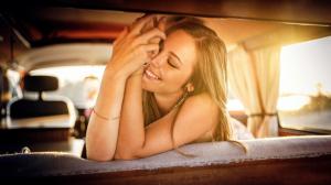 smiling women brunette car interior model inside a car wallpaper thumb