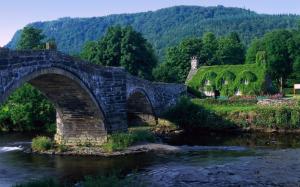Stone bridge, river, house, green wallpaper thumb