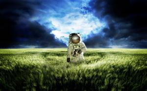 Astronaut vast green grasslands wallpaper thumb
