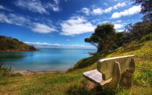 Wooden chairs and blue green water wallpaper thumb