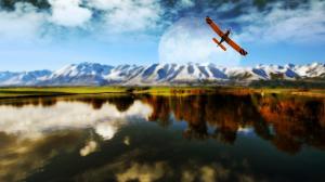 Airplane flying above the mountains wallpaper thumb