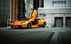 Lamborghini orange supercar side view wallpaper thumb