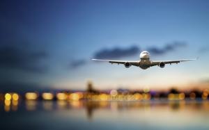 Airplane, passenger airliner, flight, sea, lights, airport, evening wallpaper thumb
