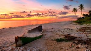 The sunset beach scenery, the sea, the broken boat, the red clouds wallpaper thumb