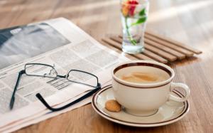 Still life, wooden table, glasses, newspaper, coffee wallpaper thumb