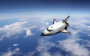 Space shuttle flying over the Earth wallpaper thumb
