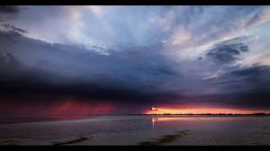 Magnificent Sunset Behind Storm Clouds wallpaper thumb