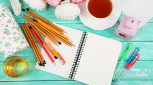 Pencils, notebook, tea, flowers wallpaper thumb