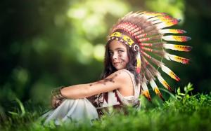 Cute little Indian girl, feathers hat wallpaper thumb