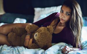 Girl with teddy bear at bed wallpaper thumb