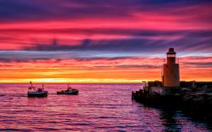 Lighthouse beach pier, sunset evening sea boats wallpaper thumb