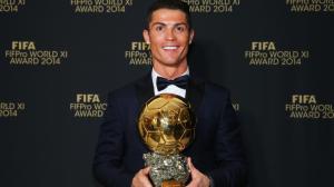 FIFA Ballon d'Or winner Cristiano Ronaldo of Portugal and Real Madrid poses with his award wallpaper thumb