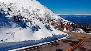 Road Through Snowy Mountains wallpaper thumb