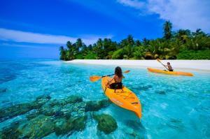 Canoe On Blue Lagoon In Maldives wallpaper thumb