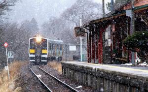 Commuter Train Arriving In Winter wallpaper thumb