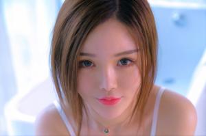 Asian closeup brunette bra straps face sensual gaze green eyes pink lipstick wallpaper thumb
