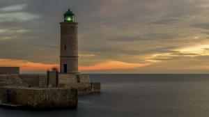 Lighthouse Ocean Sunset HD wallpaper thumb