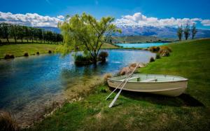 Lake, boat, trees, mountains, clouds wallpaper thumb