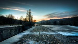 Stone Pier By A Rapid River At Sundown wallpaper thumb