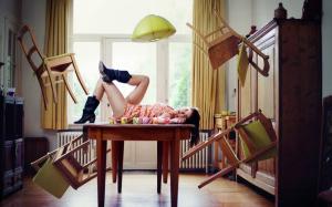 Girl in the room, chairs flying, creative wallpaper thumb