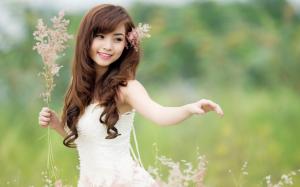 Asian girl with flowers wallpaper thumb