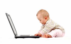 Cute baby playing laptop wallpaper thumb