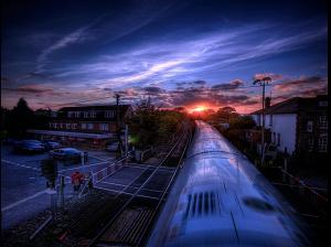 Train Leading To Sunset wallpaper thumb