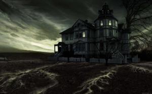 Haunted house under dark sky wallpaper thumb
