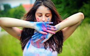 Girl colorful paint on hands wallpaper thumb