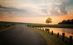 Nature landscape, sunset, tree, road, river, fence, sky clouds wallpaper thumb