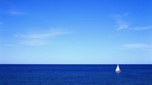 Sailboat In A Great Blue Ocean wallpaper thumb