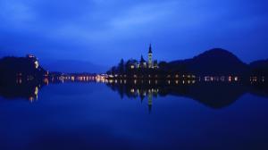 Lake Bled in Slovenia, night, lights, water reflection wallpaper thumb
