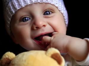 Cute baby playing doll wallpaper thumb