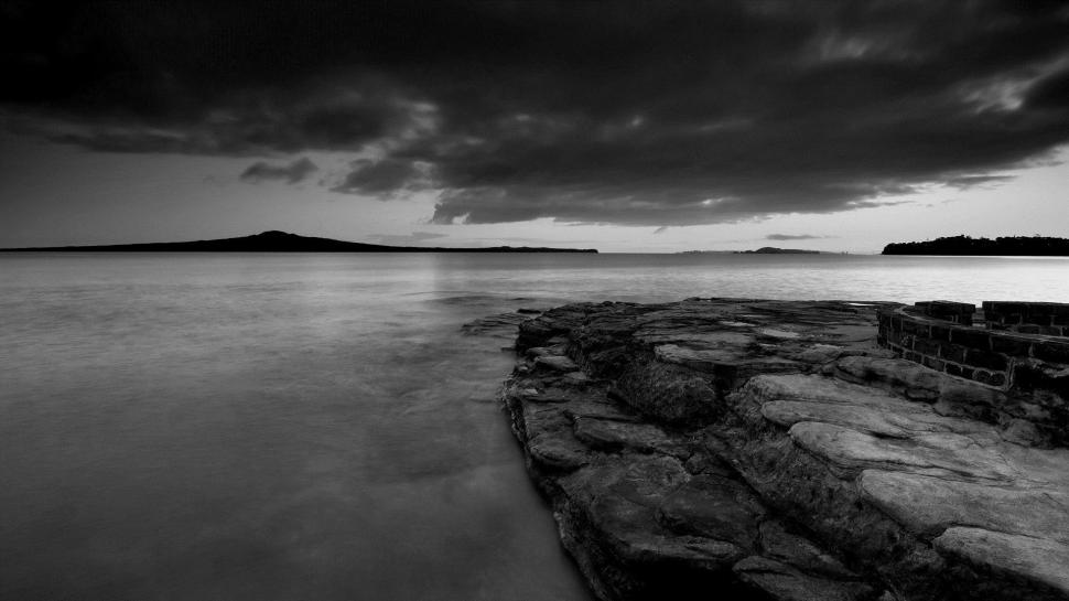 Stone Pier Under Storm Clouds wallpaper,stones HD wallpaper,pier HD wallpaper,clouds HD wallpaper,black and white HD wallpaper,nature & landscapes HD wallpaper,1920x1080 wallpaper