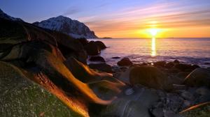Coast sunset, sea, sun, mountains, rocks wallpaper thumb