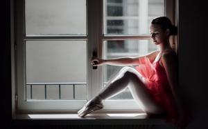 Ballerina sit at window side wallpaper thumb