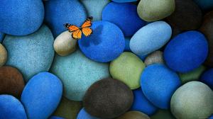 Yellow butterfly on blue stone wallpaper thumb