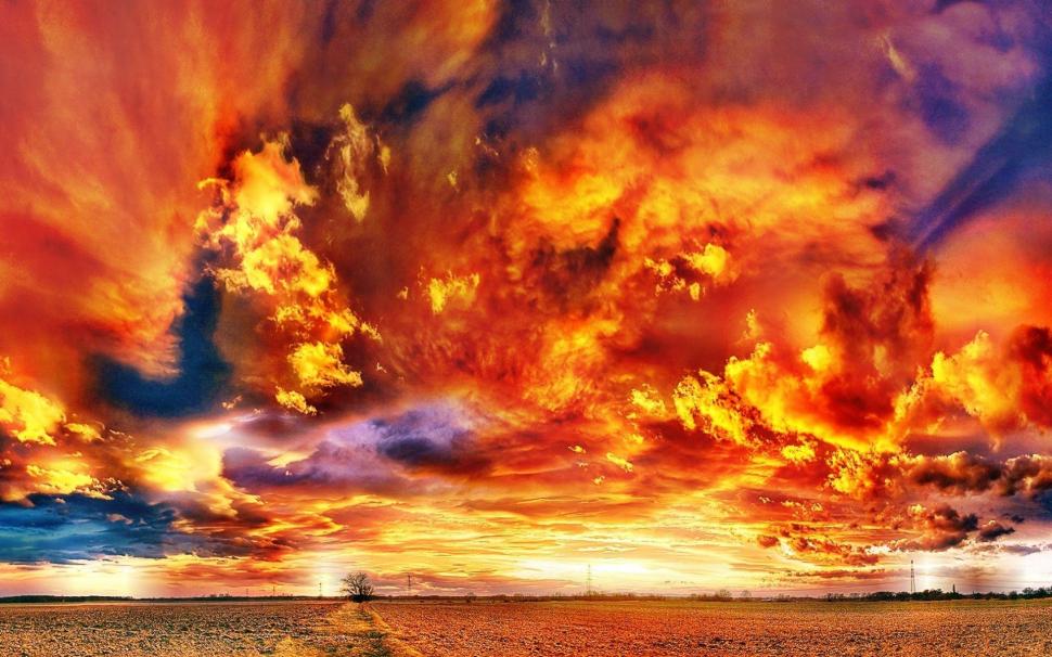 Fiery Clouds Over A Sunset Field wallpaper,sunsets HD wallpaper,fields HD wallpaper,fiery HD wallpaper,nature HD wallpaper,clouds HD wallpaper,nature & landscapes HD wallpaper,1920x1200 wallpaper