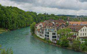 Bern, Switzerland, river, house, trees, cloudy sky wallpaper thumb